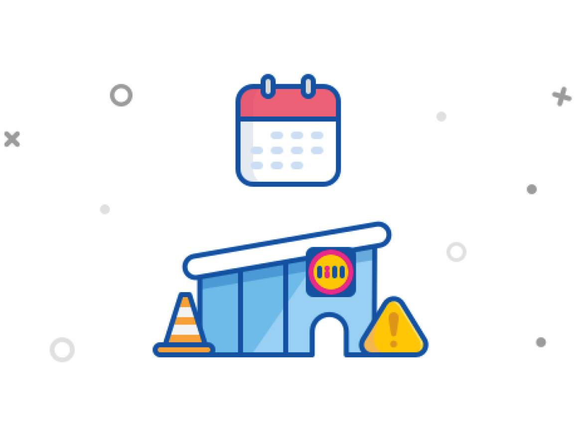 Kalendar iznad zgrade s prometnim čunjem i znakom upozorenja.