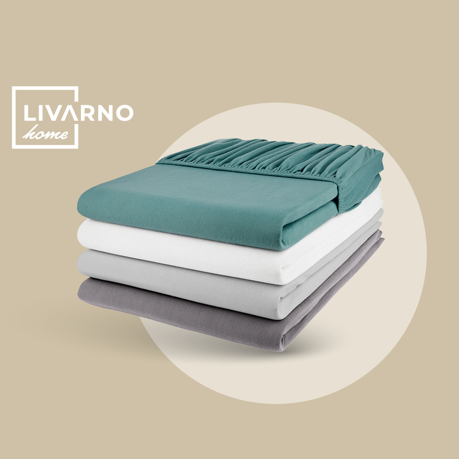 Složene plahte u zelenoj, bijeloj i dvije nijanse sive boje.